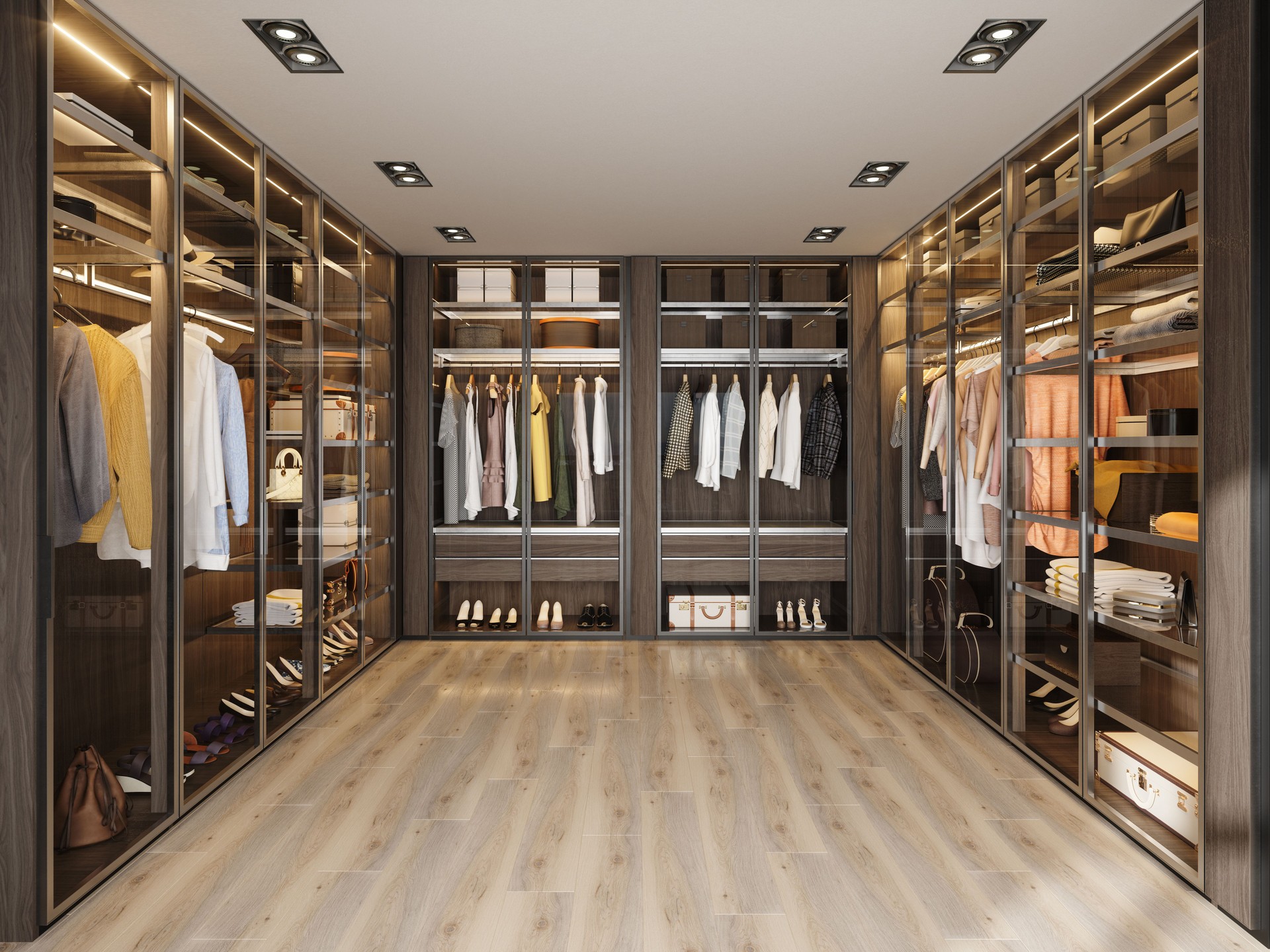 Modern Dressing Room With Shoes, Bags And Hanging Clothes